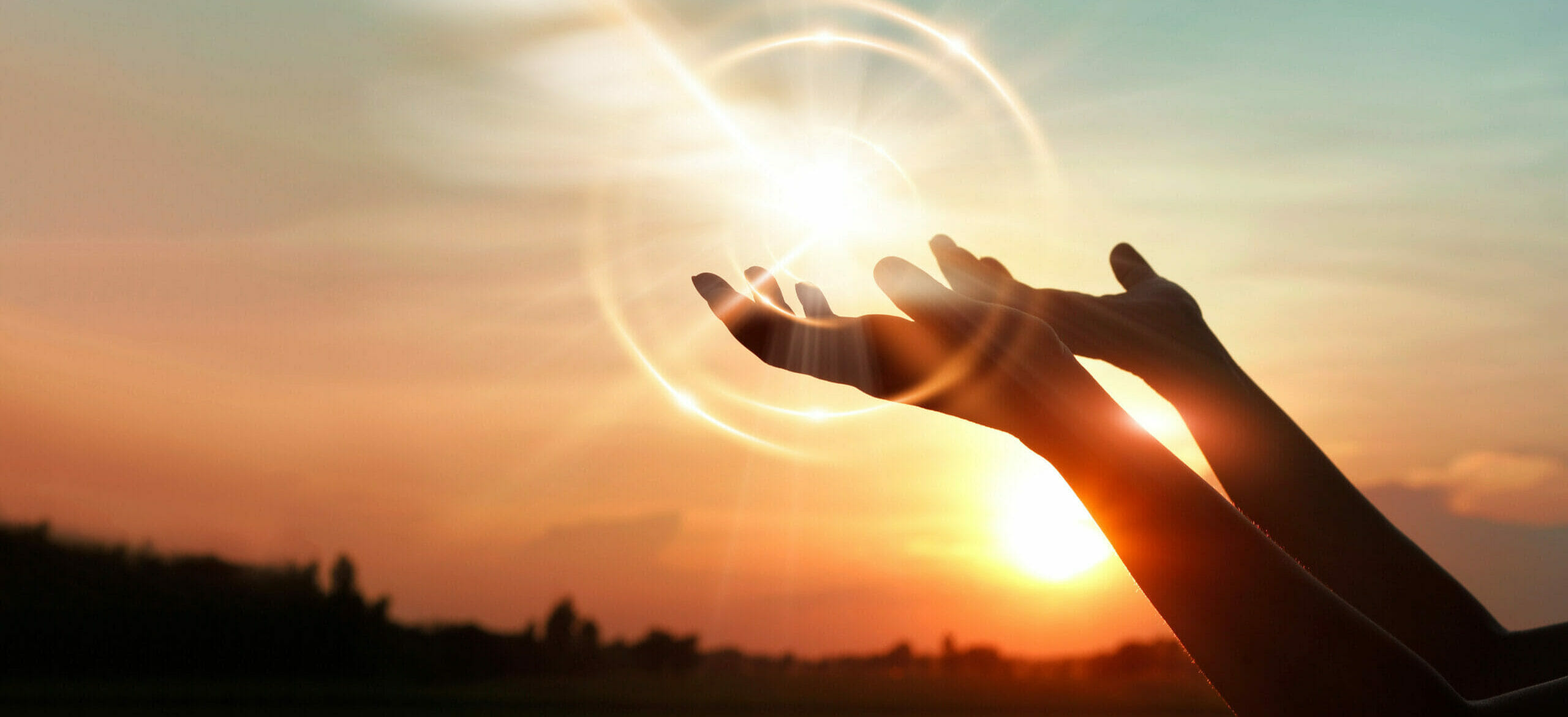 Contact: Woman hands praying for blessing from god on sunset background