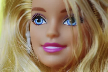 closeup photo of Barbie doll face